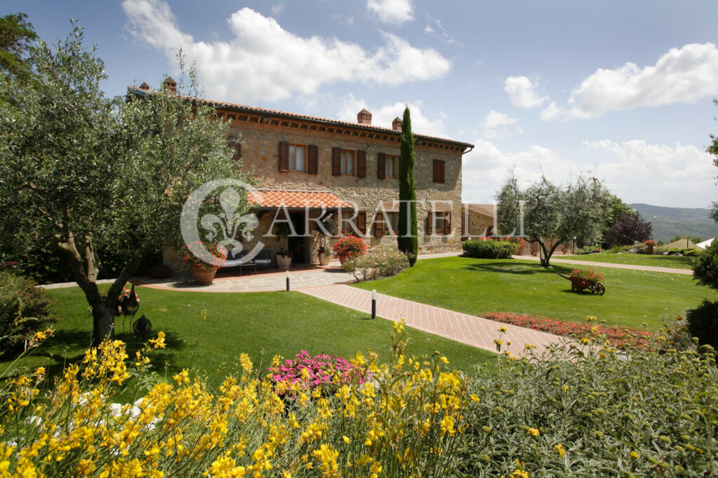 Village with pool and land near Volterra