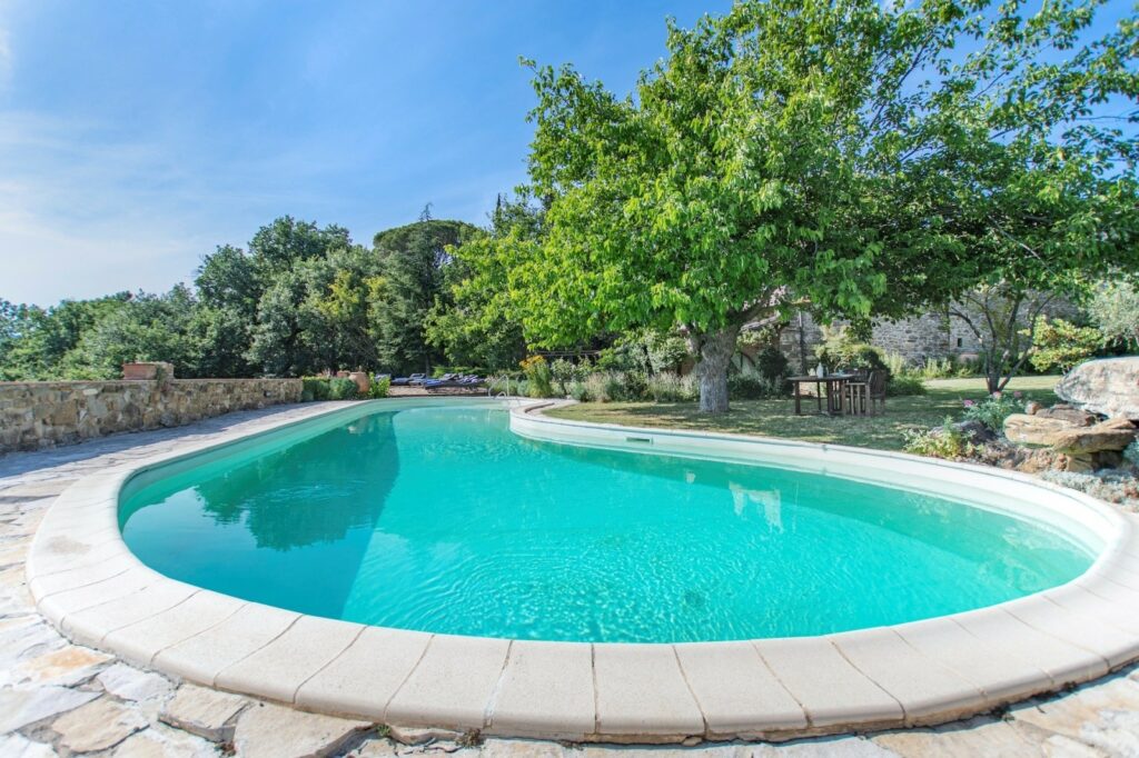 Casale in pietra con piscina panoramica in Greve
